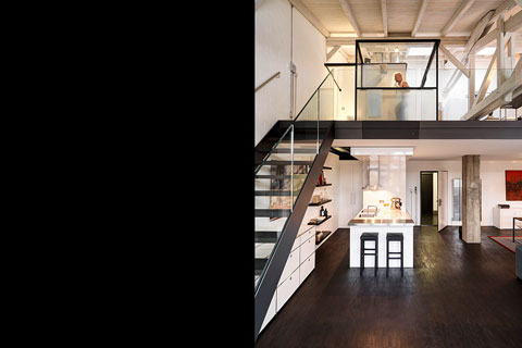 black steel staircase, dark wooden floor