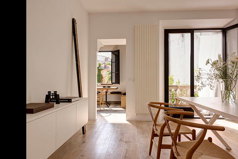 bright light, livingroom, view towards another room in the background